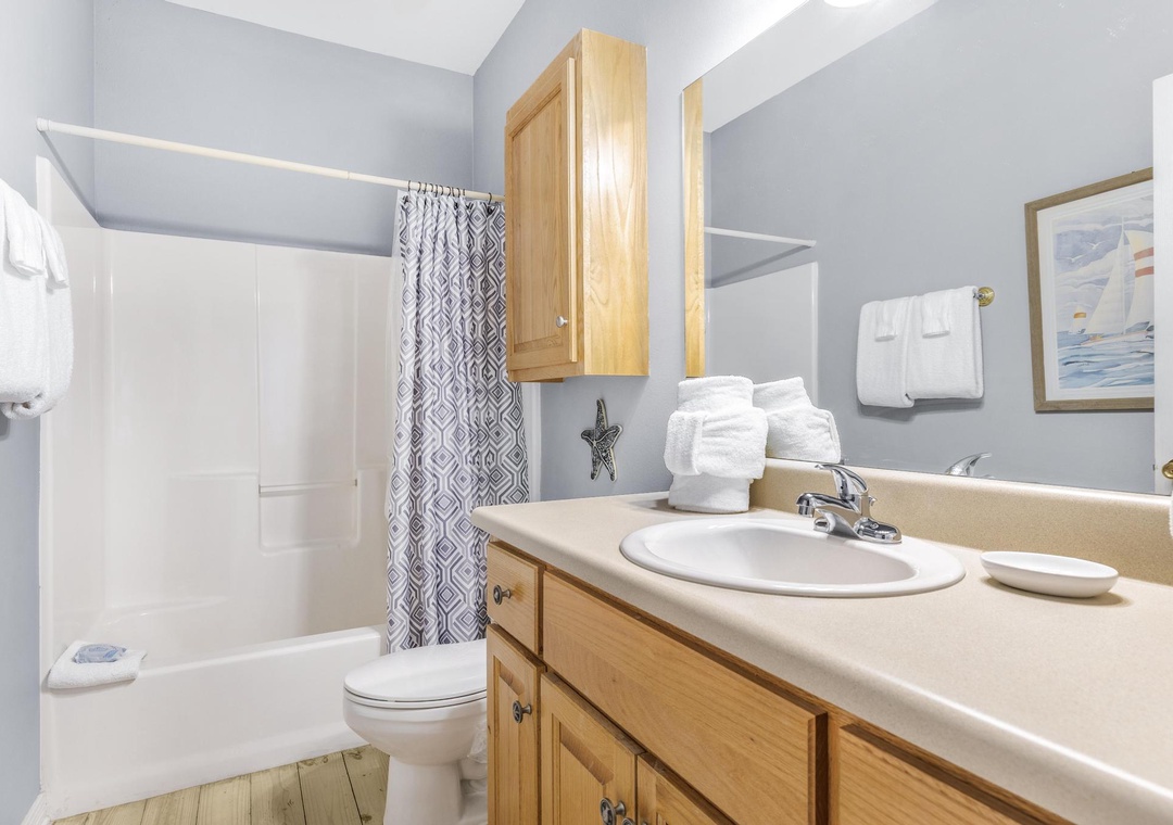 Primary bathroom with shower/tub combo