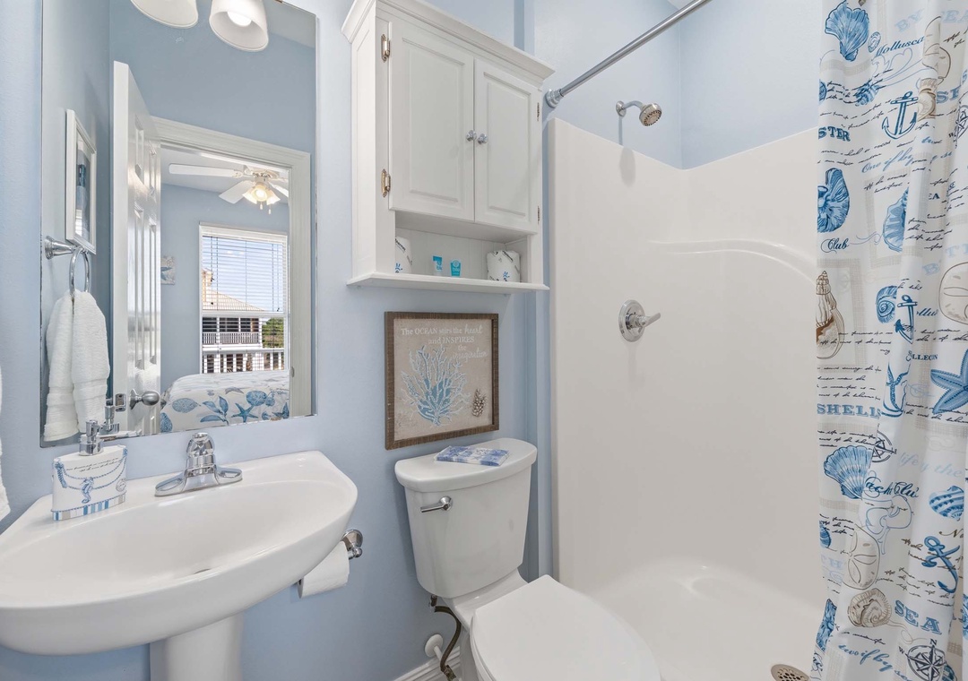 Main level full bathroom with walk-in shower