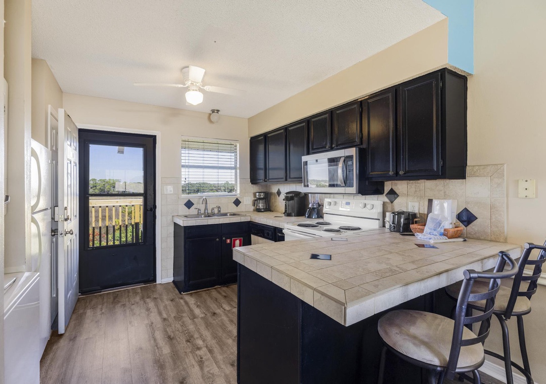 Kitchen with breakfast bar seating
