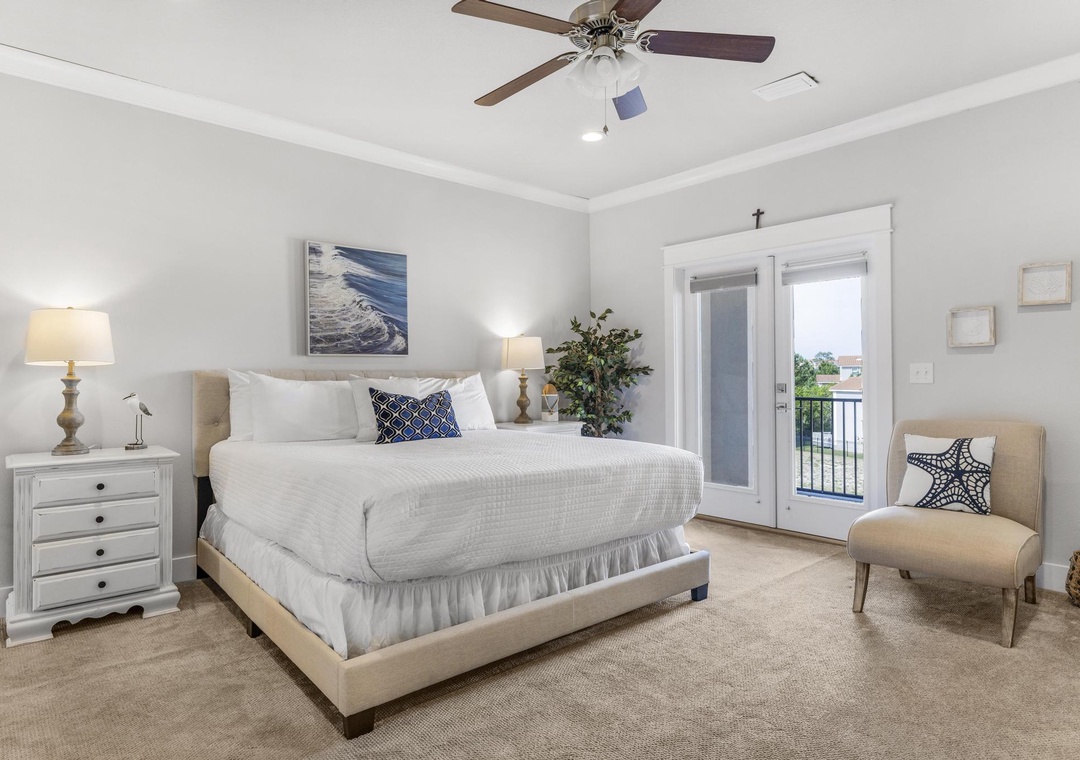 Third floor king primary bedroom with private balcony