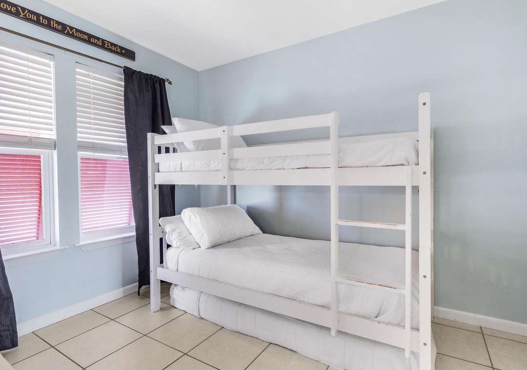 Twin-over-twin bunk bed with twin trundle