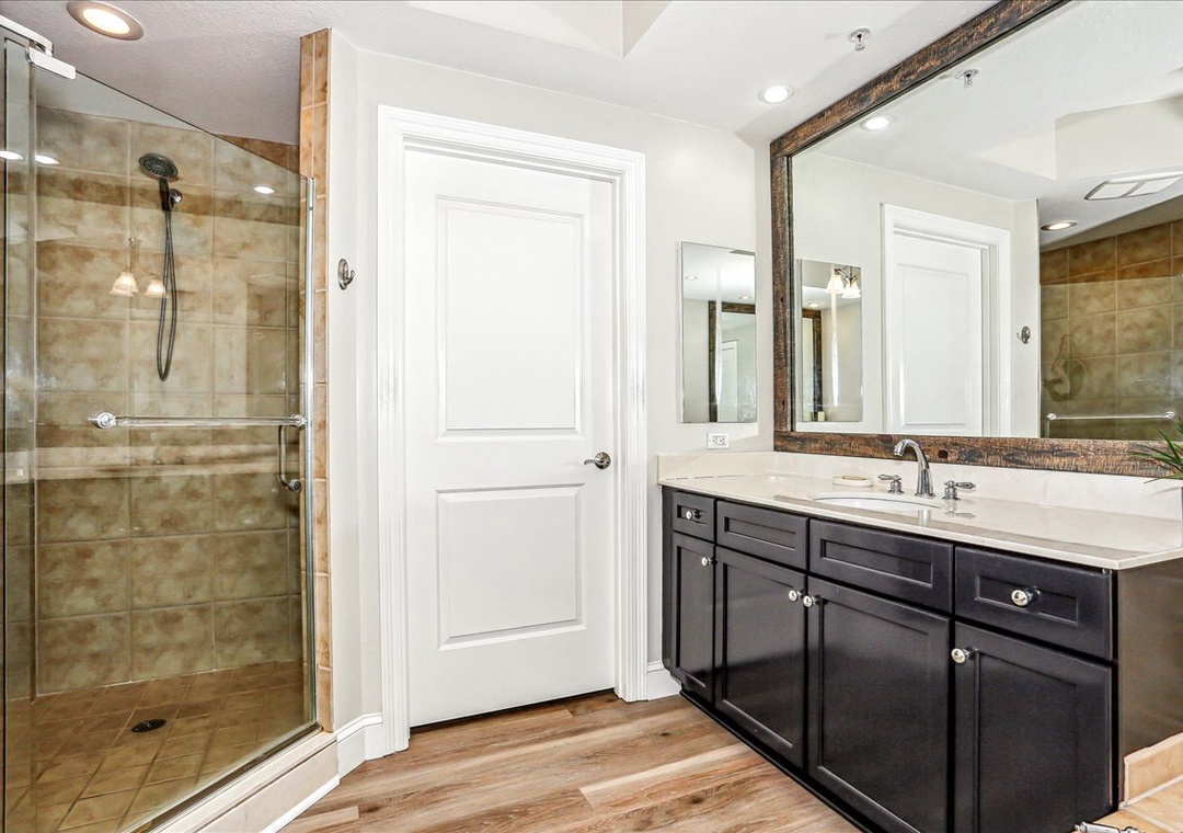 Walk-in shower in the primary ensuite bathroom