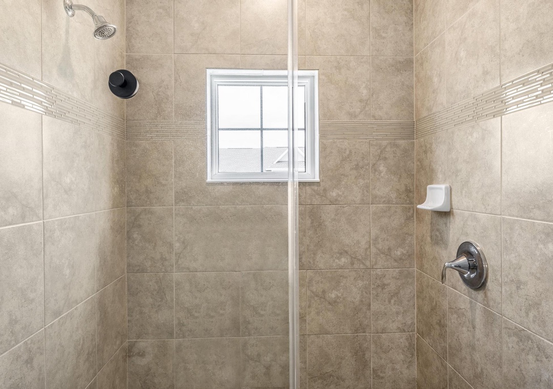 Walk-in shower in the primary bathroom