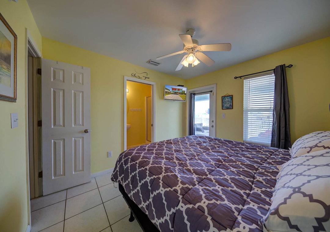 Main bedroom with flat screen TV.