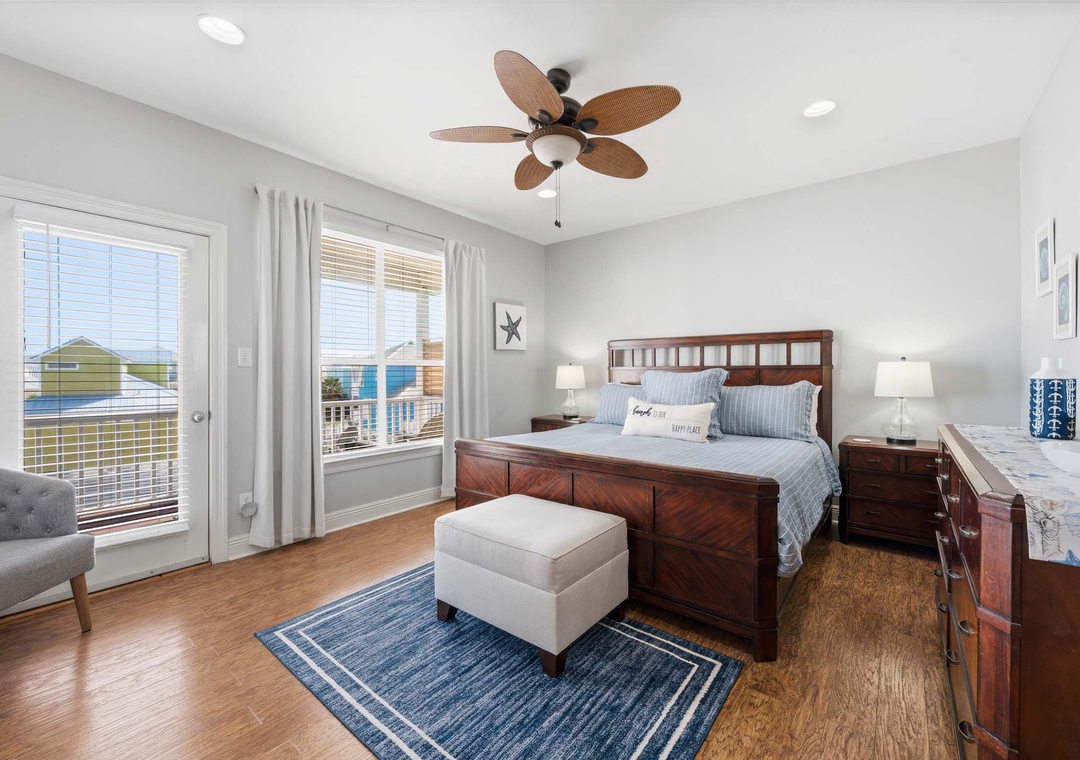 Top floor primary suite with balcony access