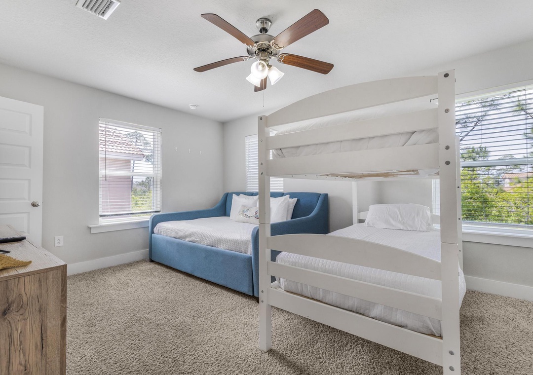 Third floor guest bedroom 3 with full daybed and twin-over-twin bunk bed