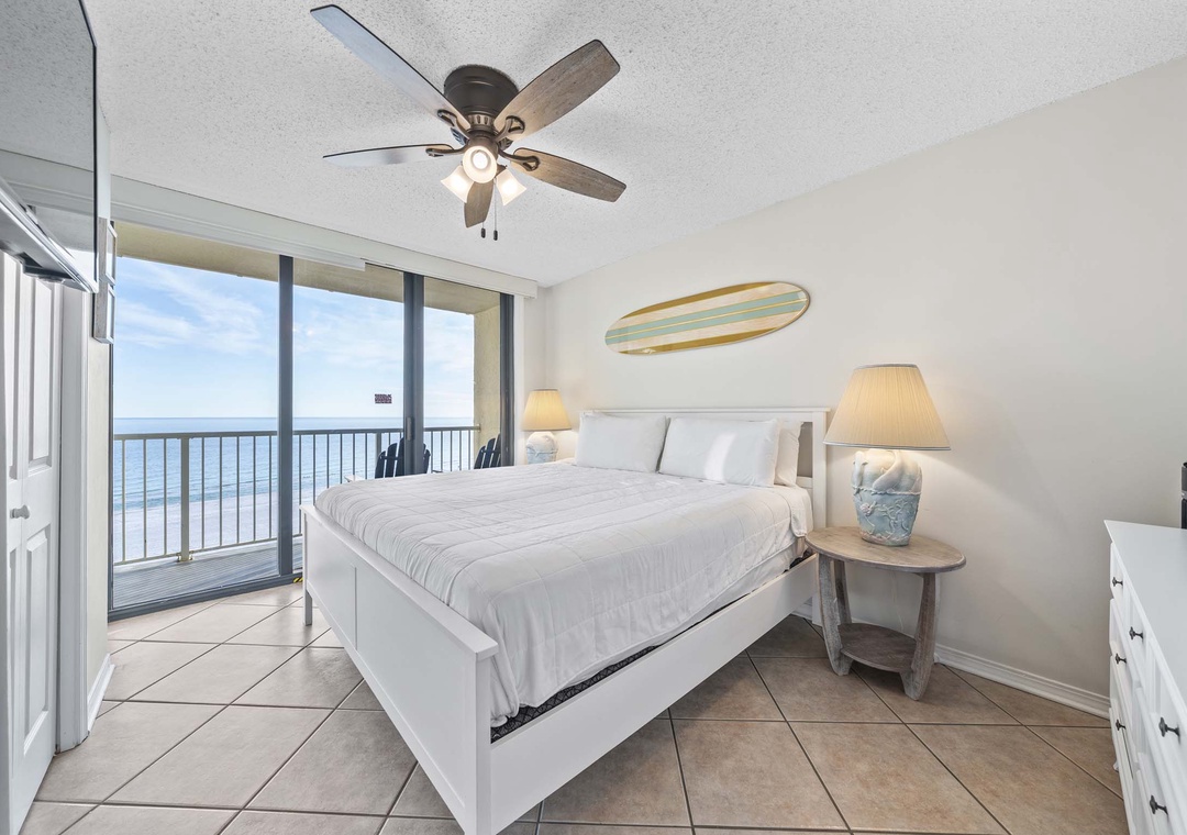 Primary bedroom with balcony access