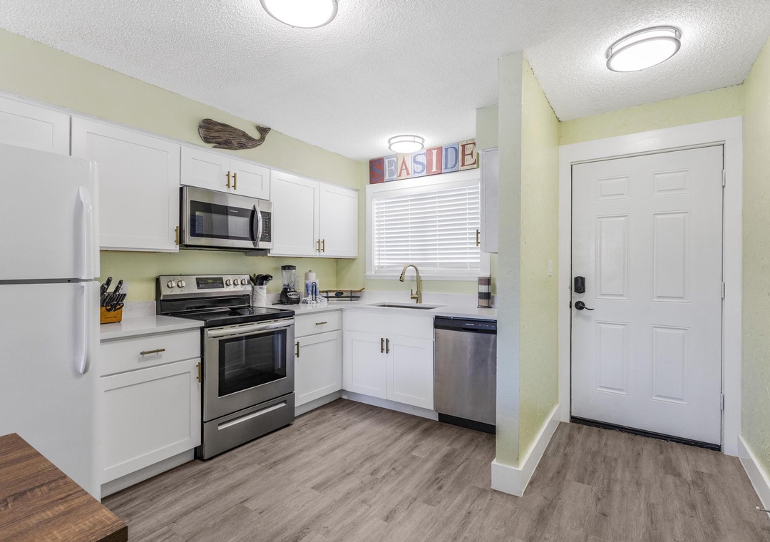 Updated kitchen with white cabinetry