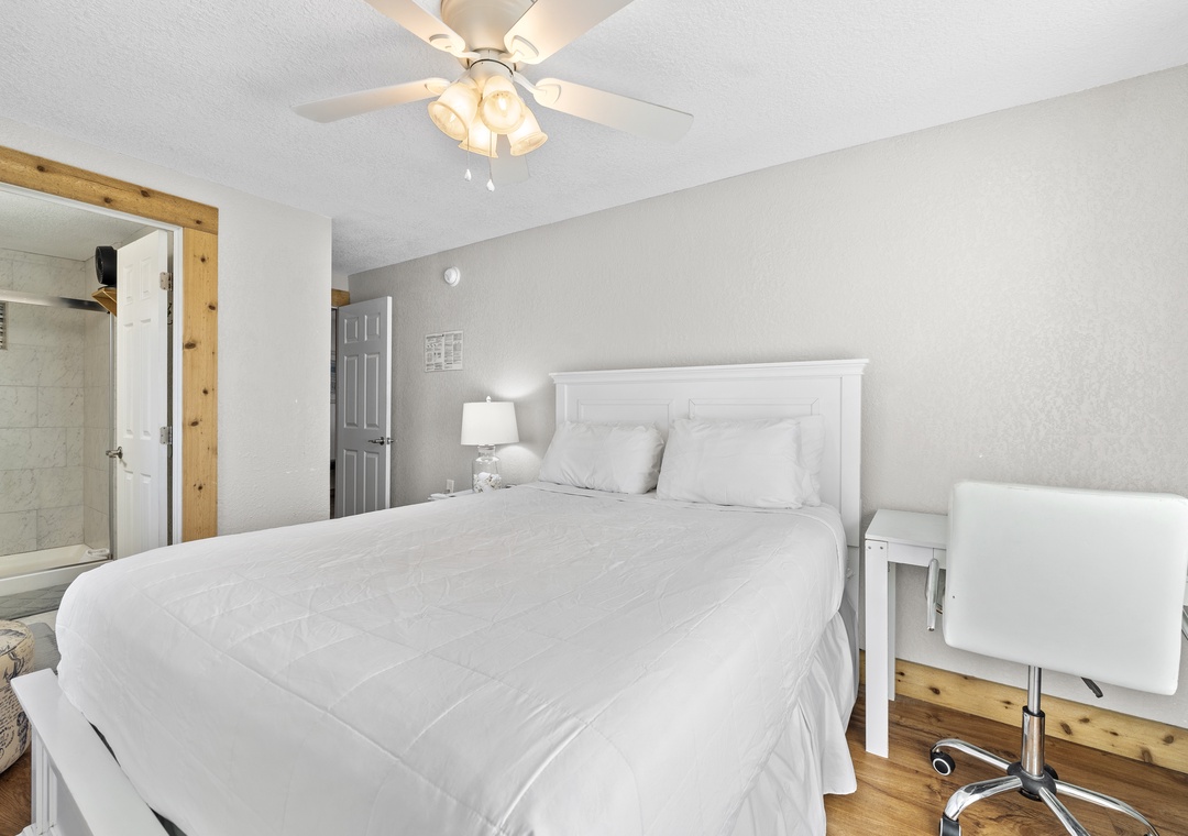 Bedroom 4 with queen bed and desk