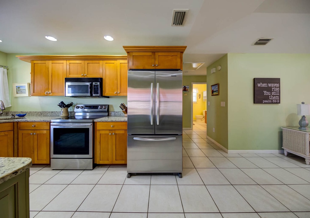 Updated kitchen with stainless steel appliances.