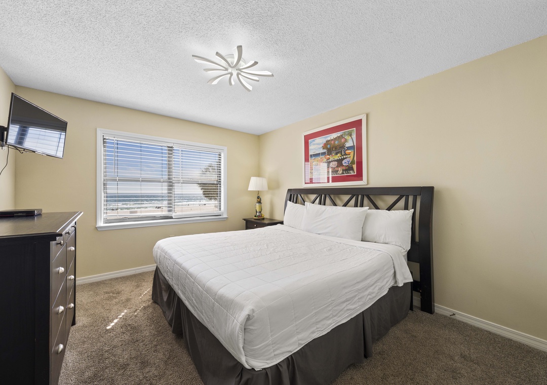 Primary bedroom with a king bed