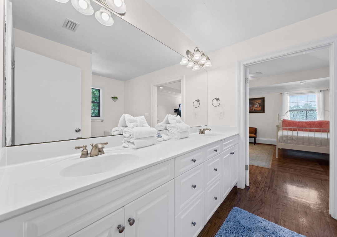 Large double vanity in the second primary ensuite bathroom