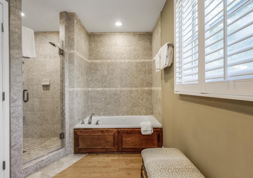 Garden tub and walk-in shower in the primary bathroom