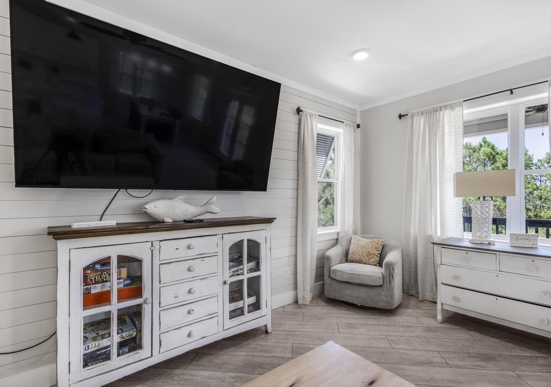 Relax with a movie on the large flat-screen TV