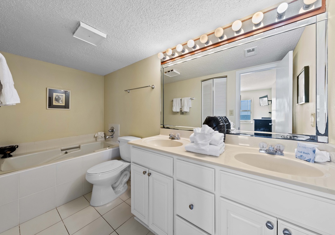 Primary ensuite bathroom with large garden tub