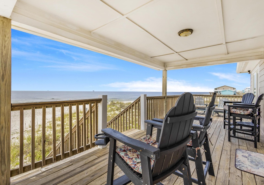 Deck with beach views and steps down to the sand