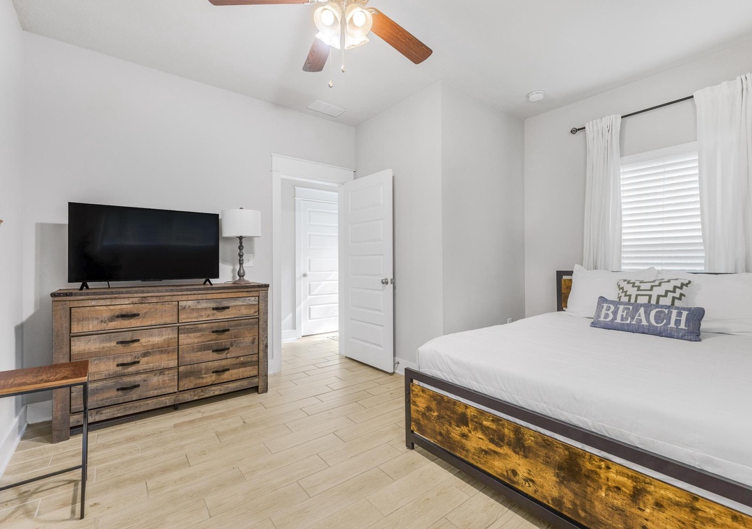 First floor guest bedroom 3 with queen bed