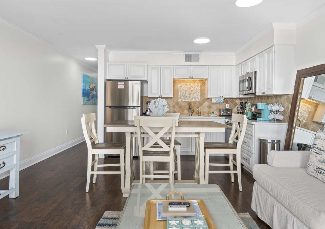 Living, dining and kitchen area