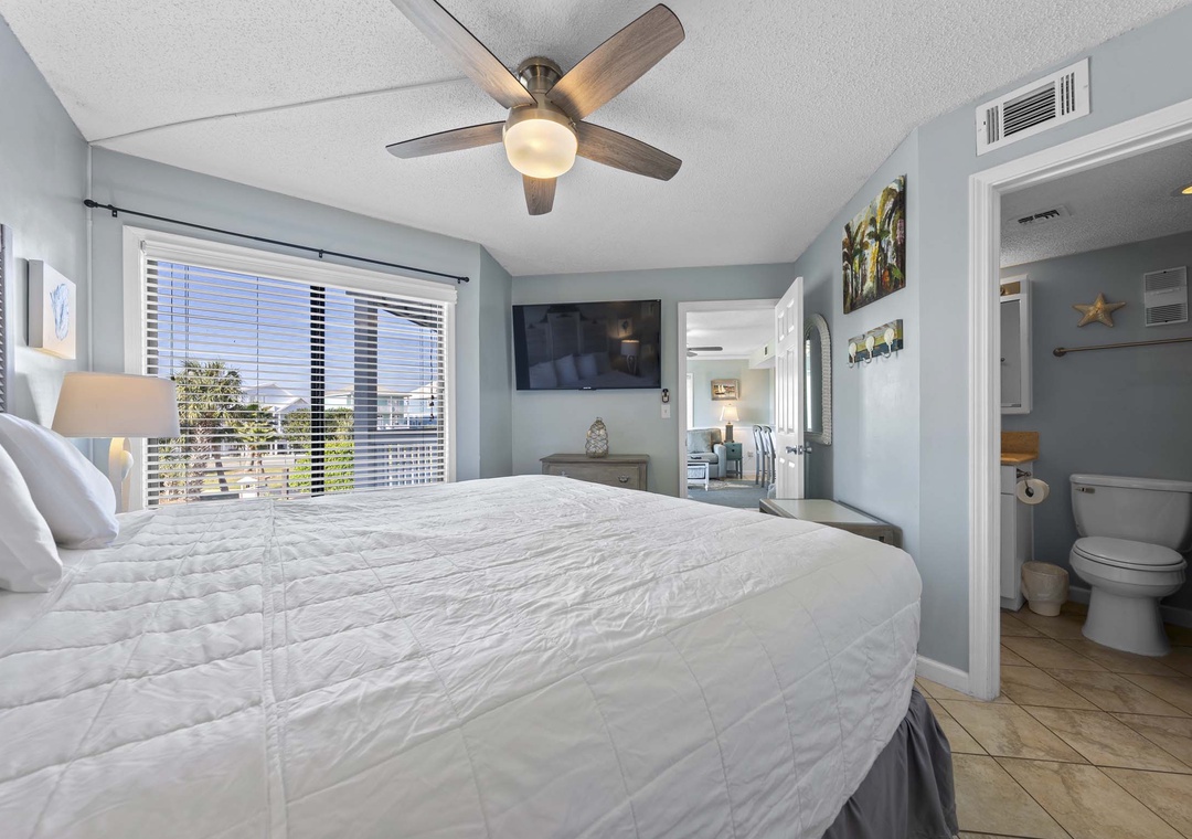 Primary bedroom with flat-screen TV
