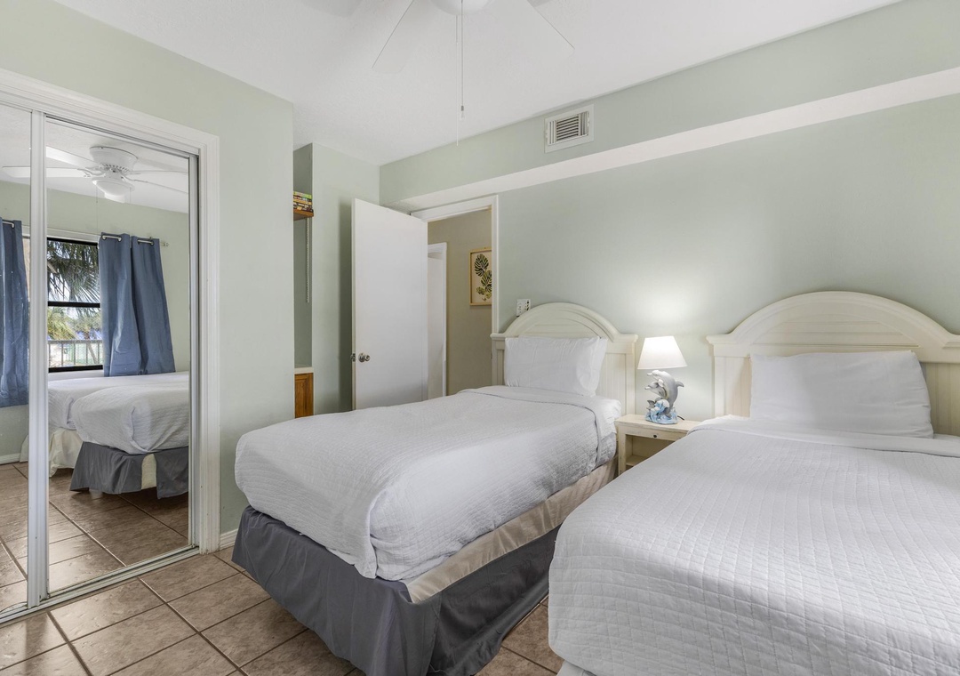 Two twin beds in the second guest bedroom