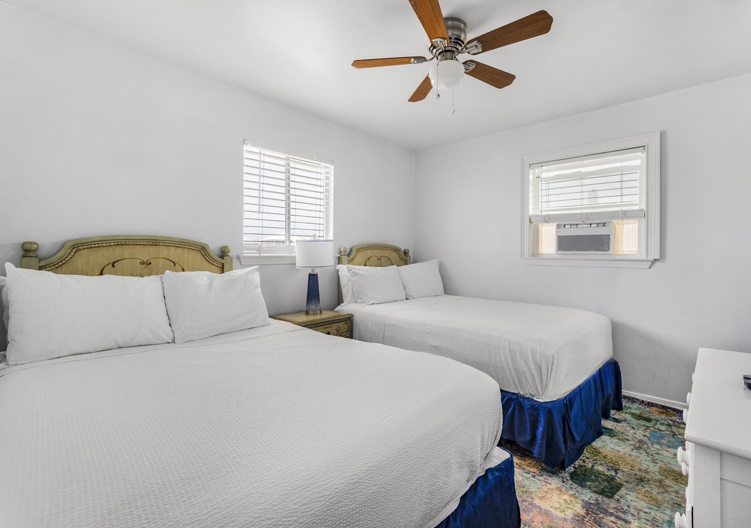 Two double beds in guest bedroom 2