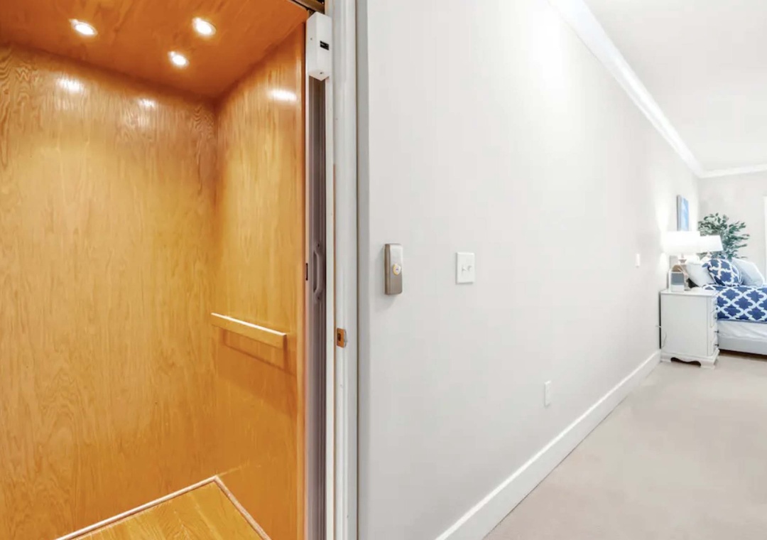 Take the private elevator to the third floor