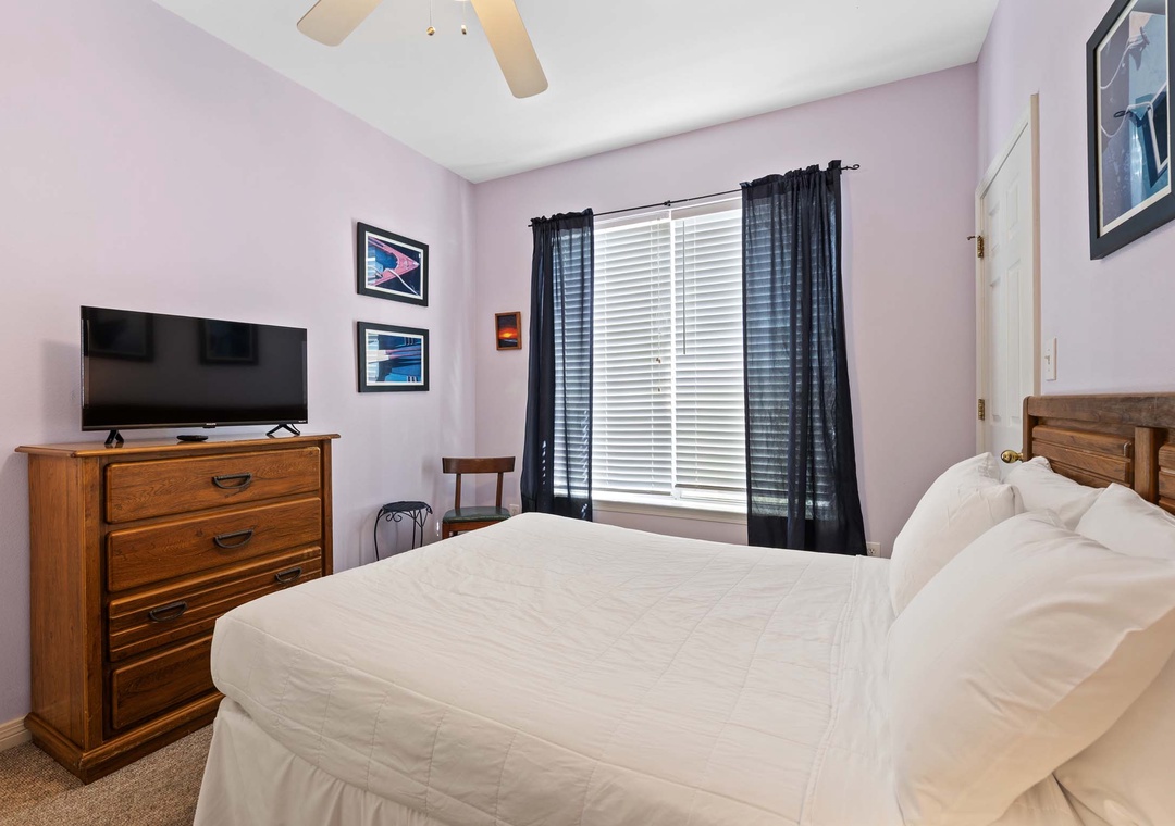 Guest bedroom 1 has a full-size bed