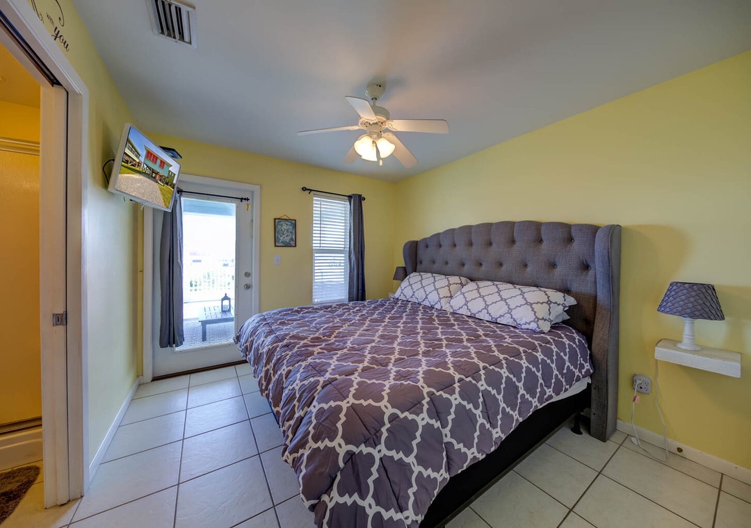 Main bedroom with access to balcony.