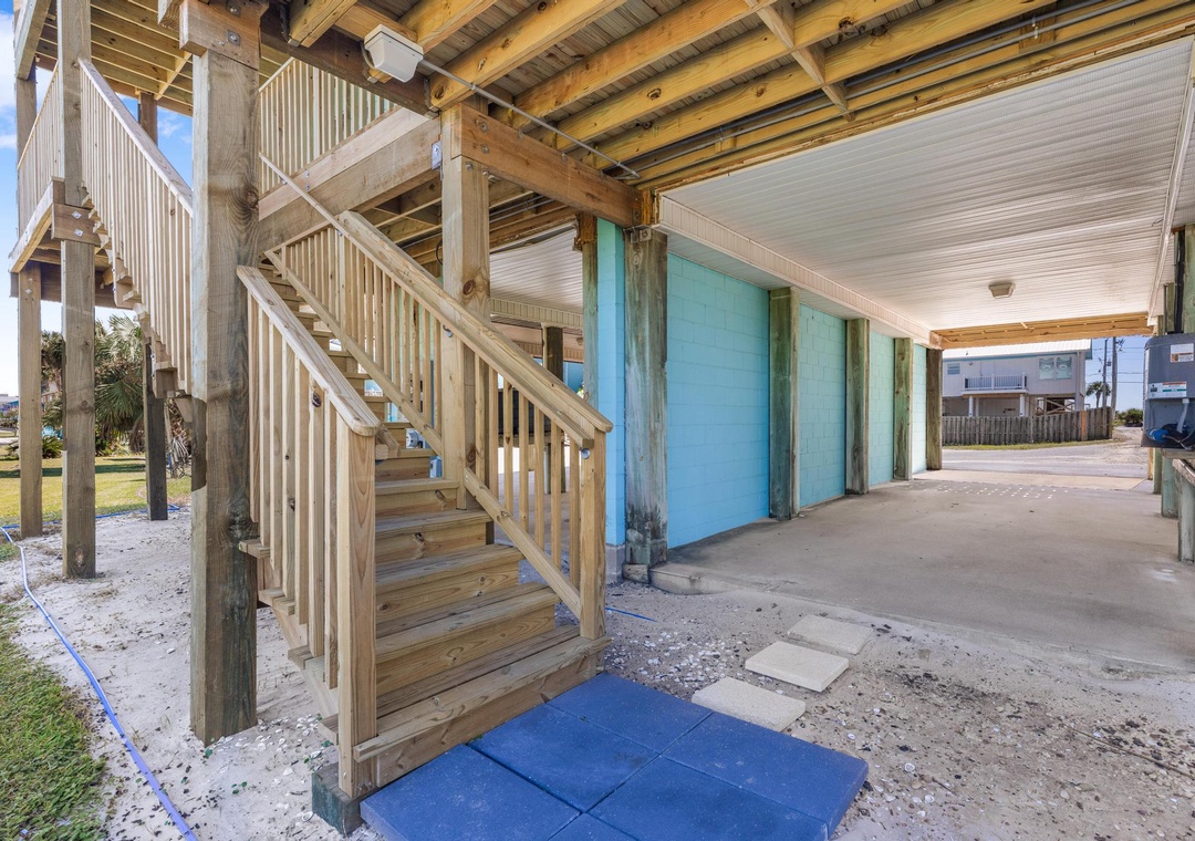 Covered parking and stairs up to the condo