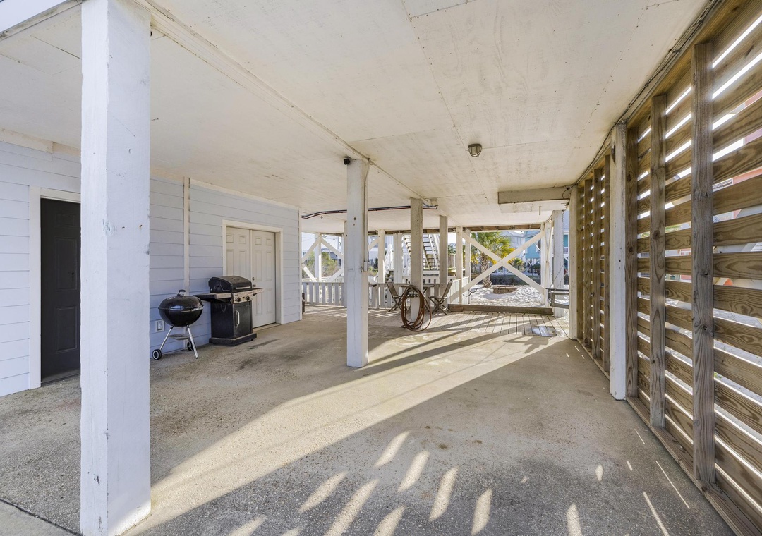 Covered patio space with grills