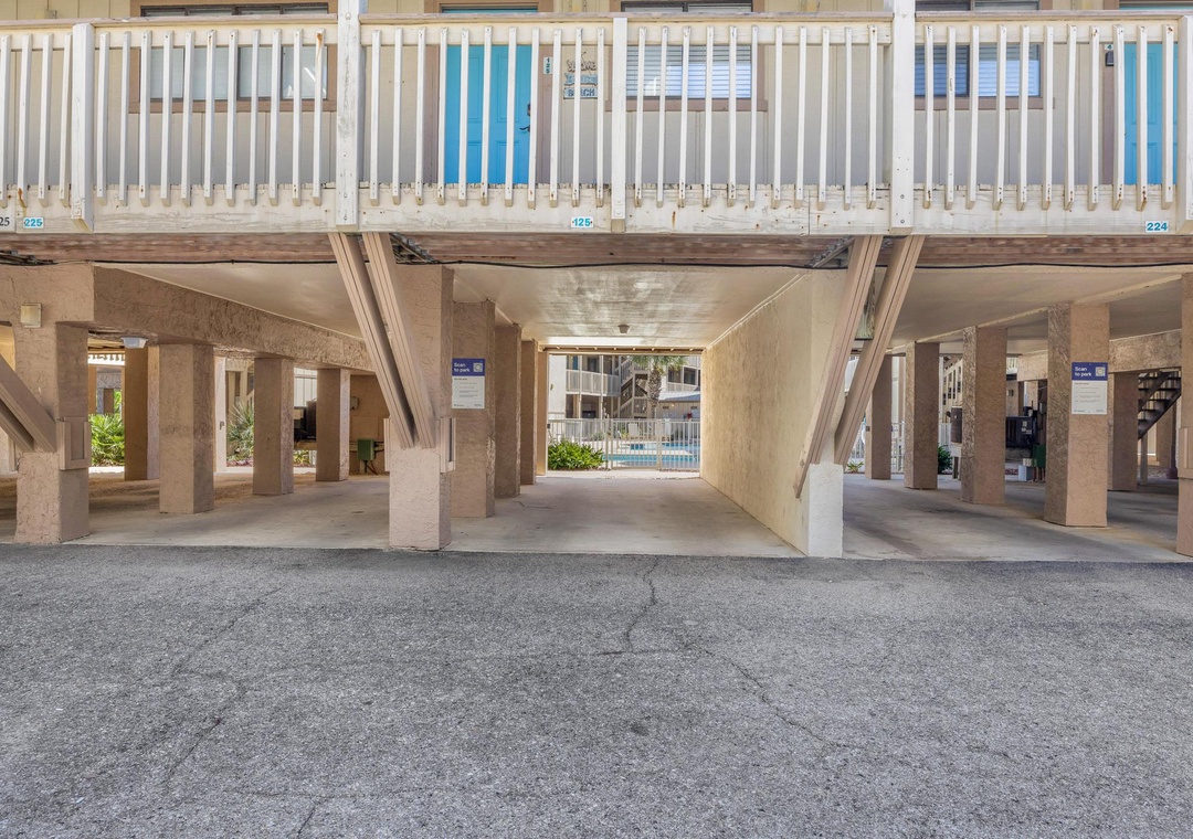Covered parking beneath the building