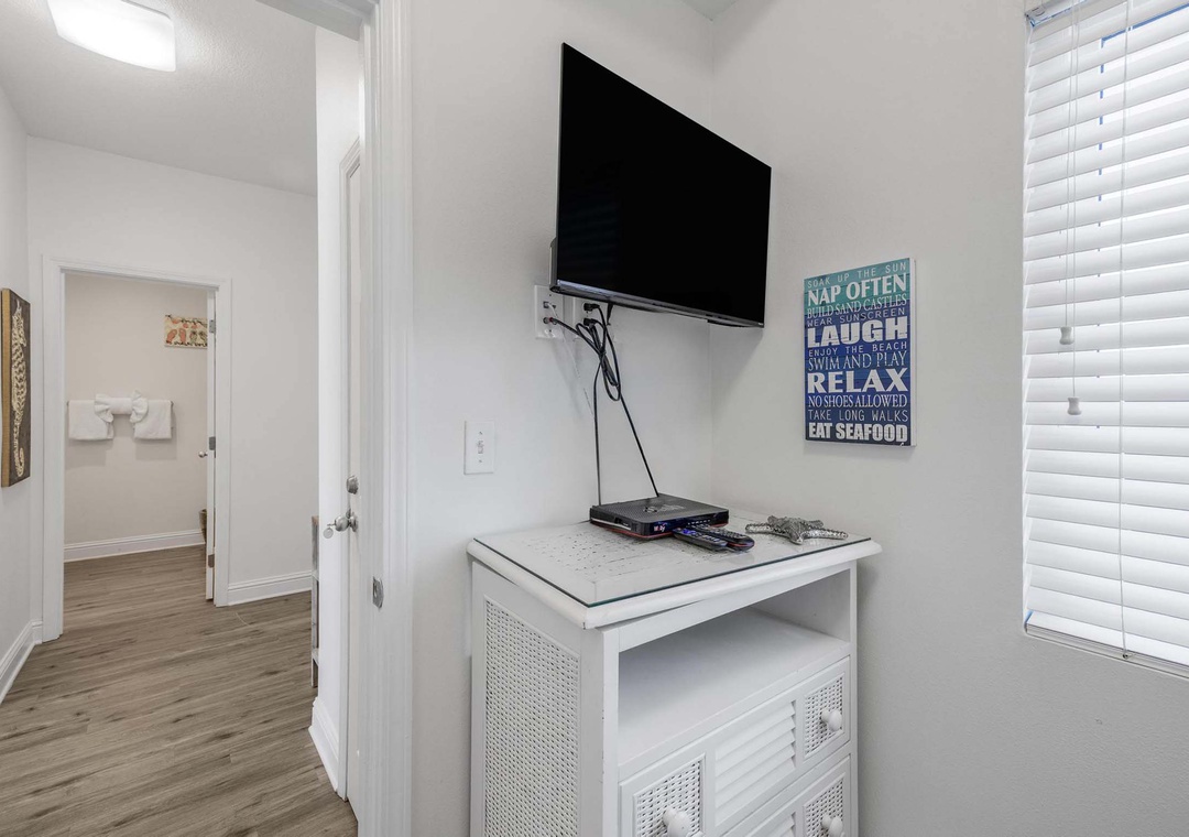 Bunk room with flat-screen TV