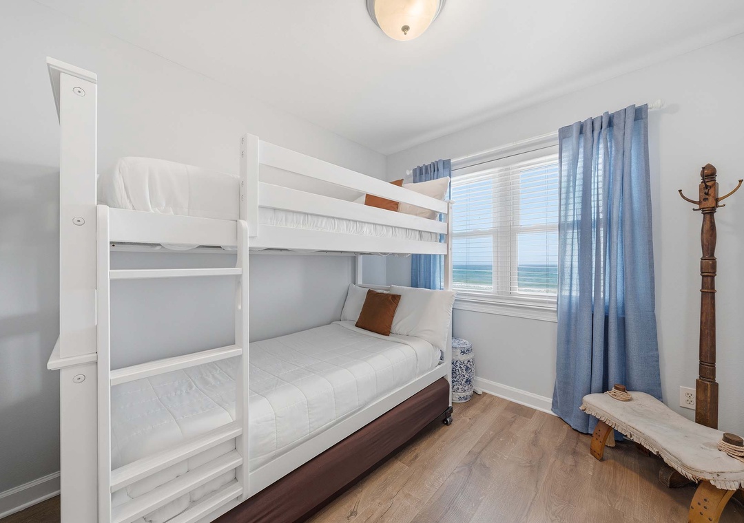 Upstairs common area with twin-over-twin bunk bed