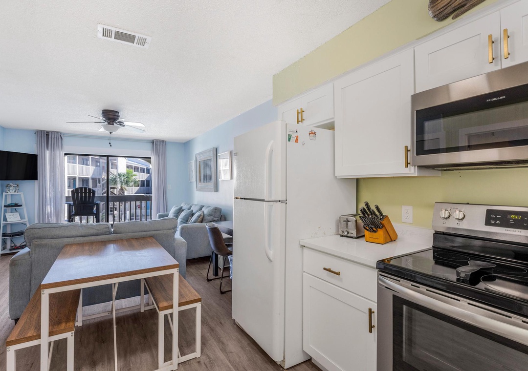 Kitchen open to dining and living room