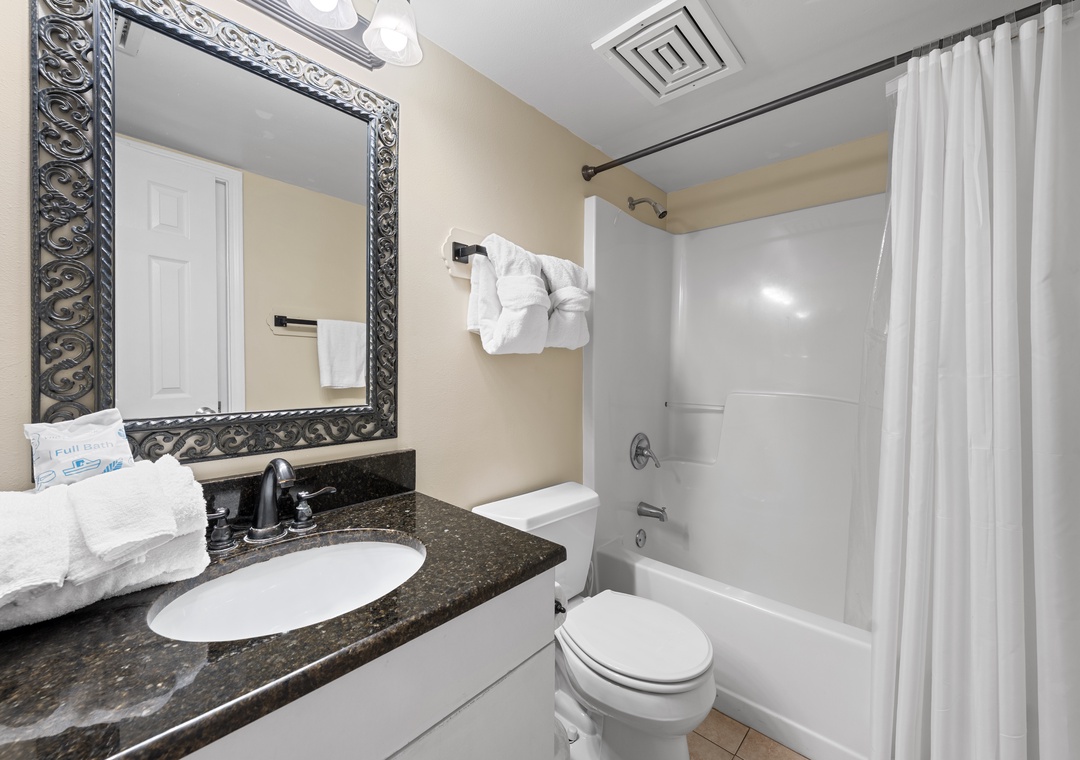 Full bathroom with shower/tub combo