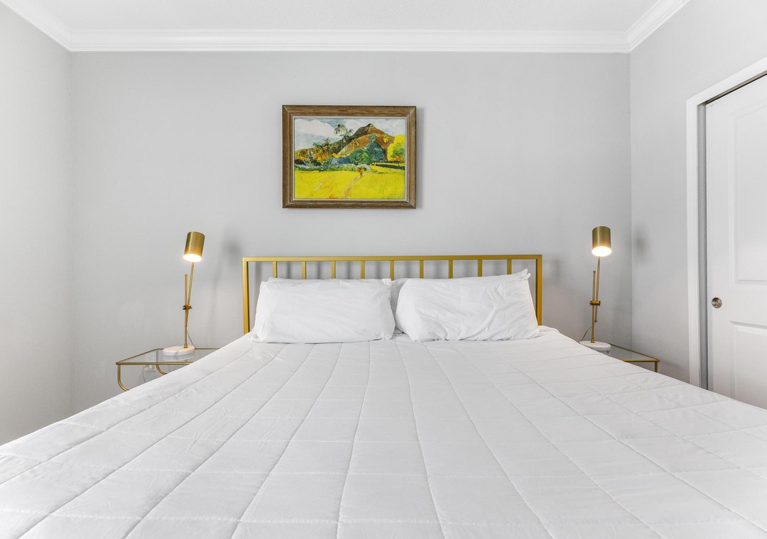Upstairs primary bedroom with king bed
