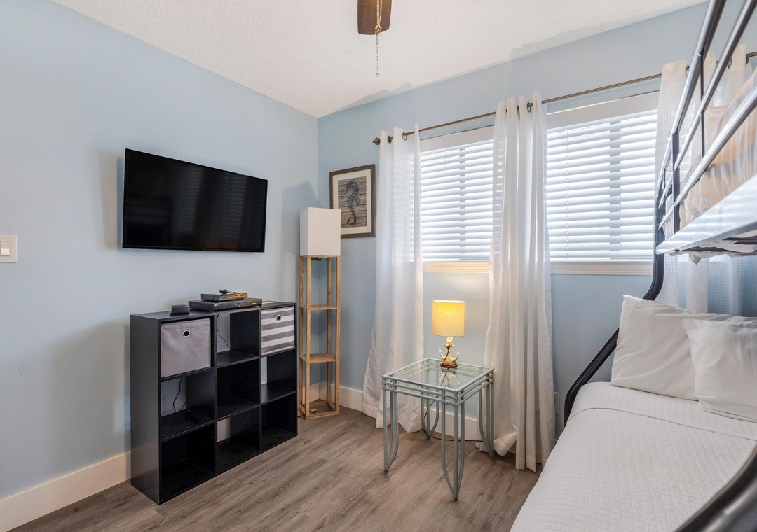 Guest bedroom with flat-screen TV