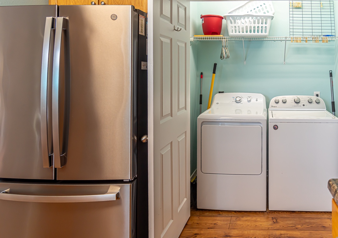 In-unit laundry off of the kitchen