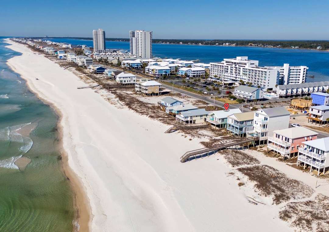 Situated directly on the sugar white sands of Gulf Shores