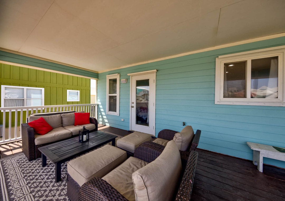 Comfortable seating on the private balcony.