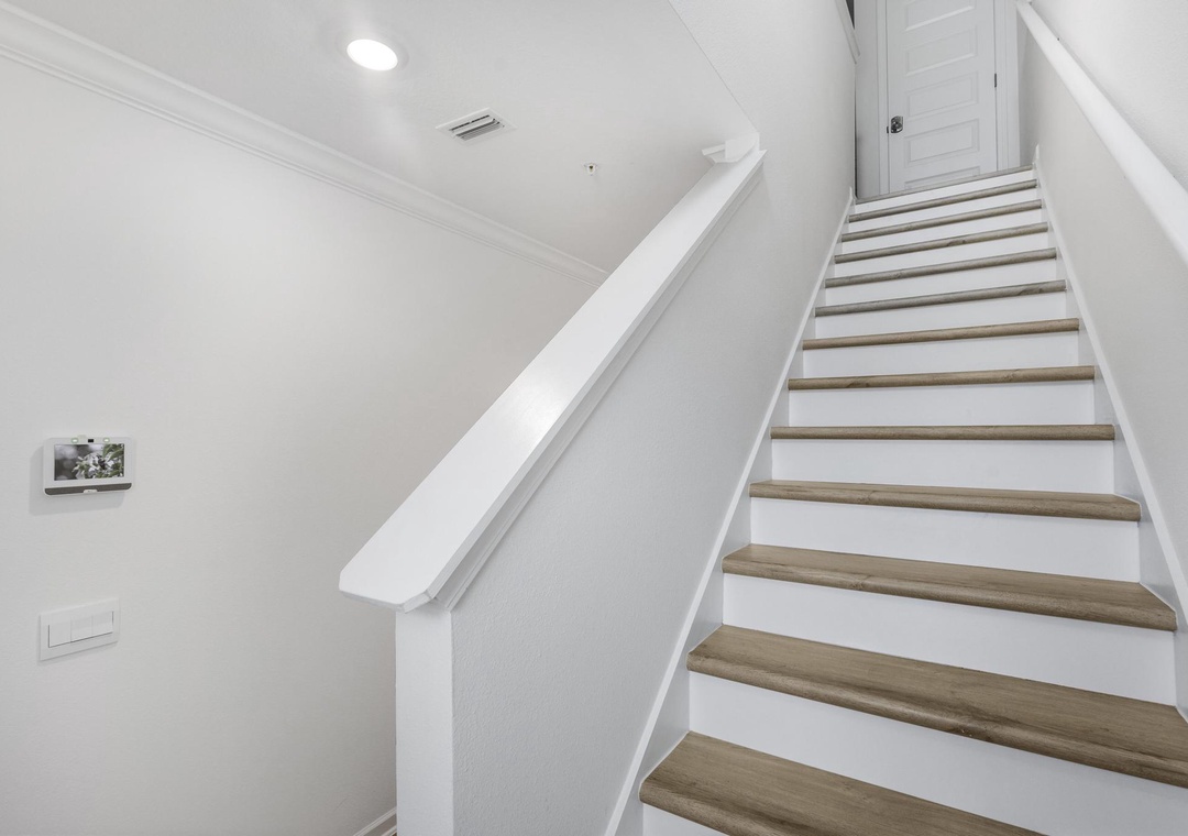 Head upstairs to the guest bedrooms
