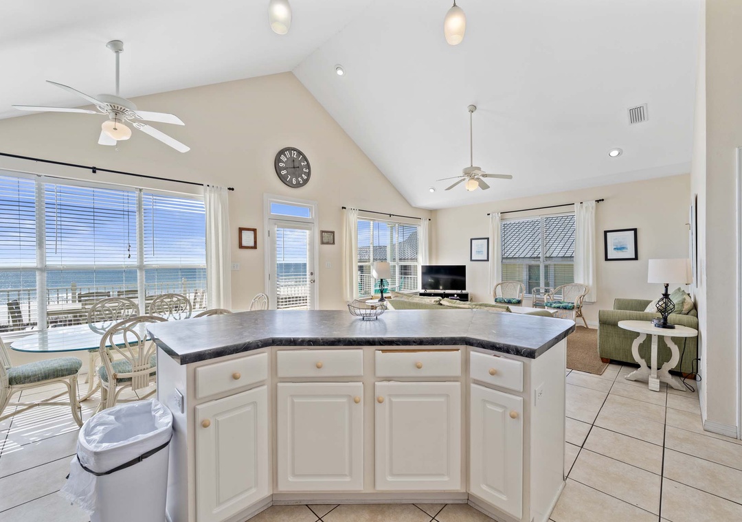 Kitchen island overlooking the living space and the Gulf waters