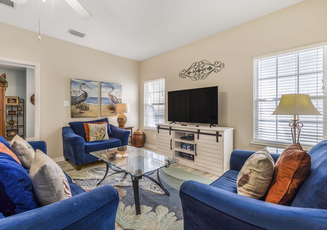 Comfortable living room with large flat-screen TV