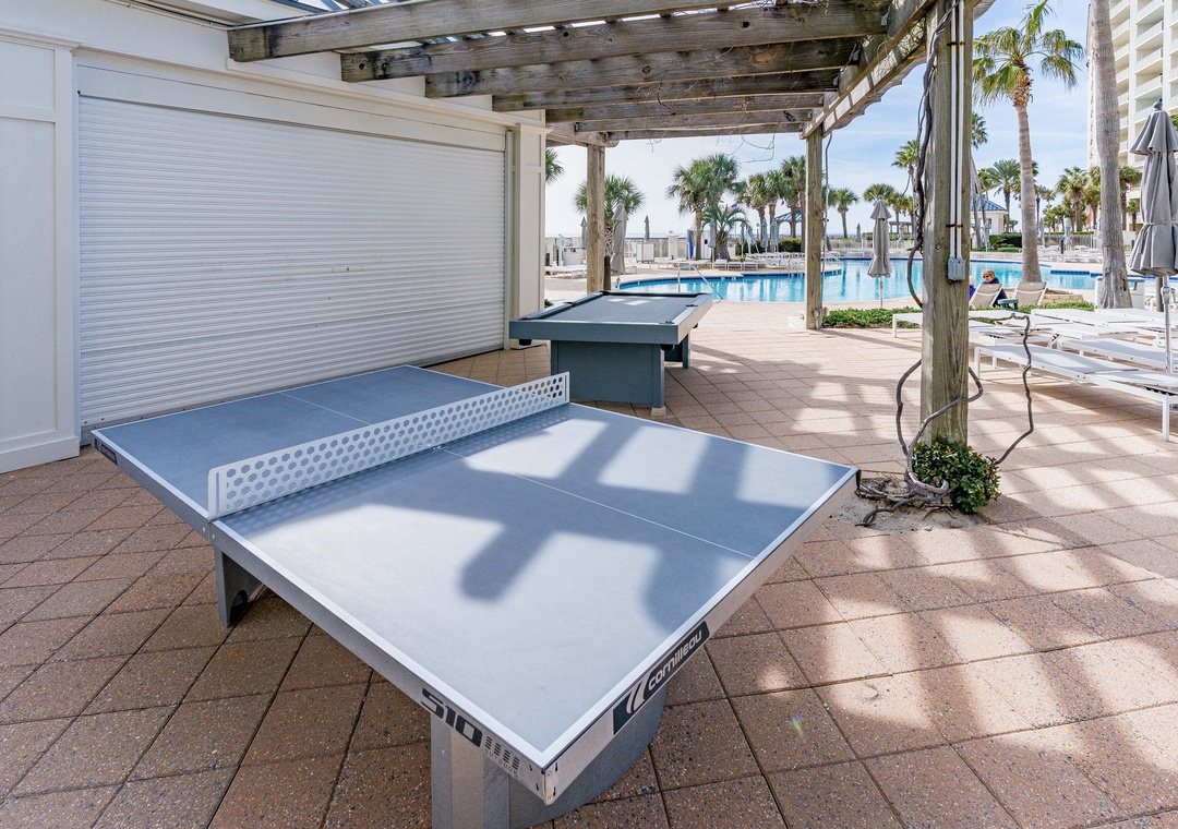 Ping pong tables by the pool