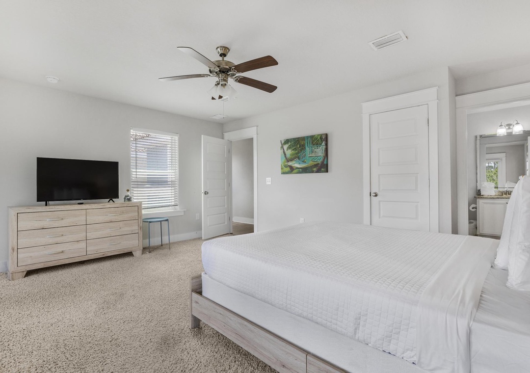 Third floor guest bedroom 2 with queen bed
