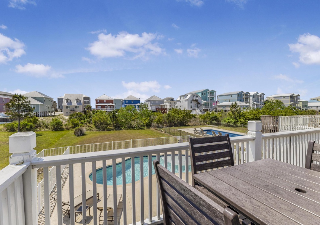 Dine al fresco with pool views