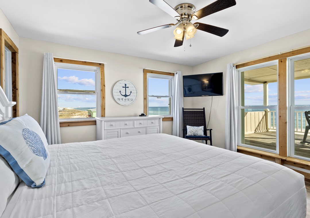 Second floor bedroom 6 with king bed and balcony access