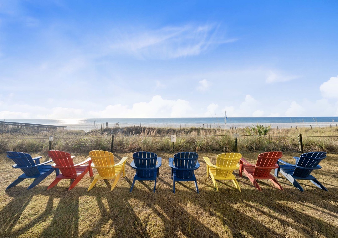 Adirondack chairs overlooking the water