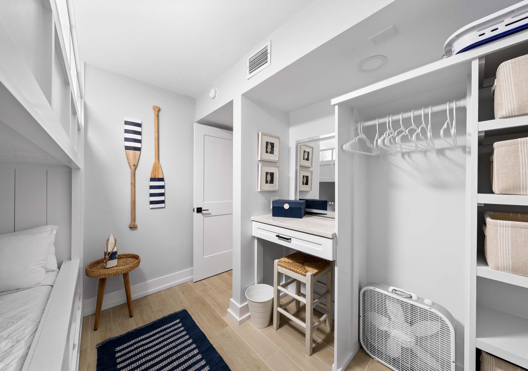 Guest bedroom with queen-over-queen bunk beds