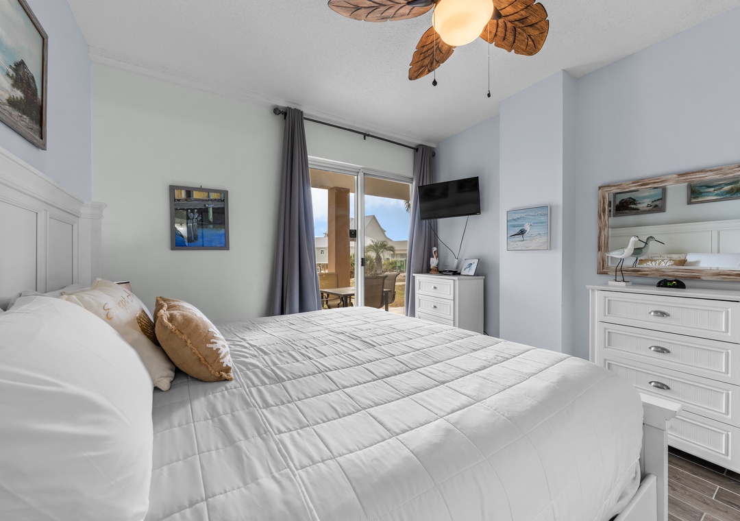 Primary bedroom with patio access